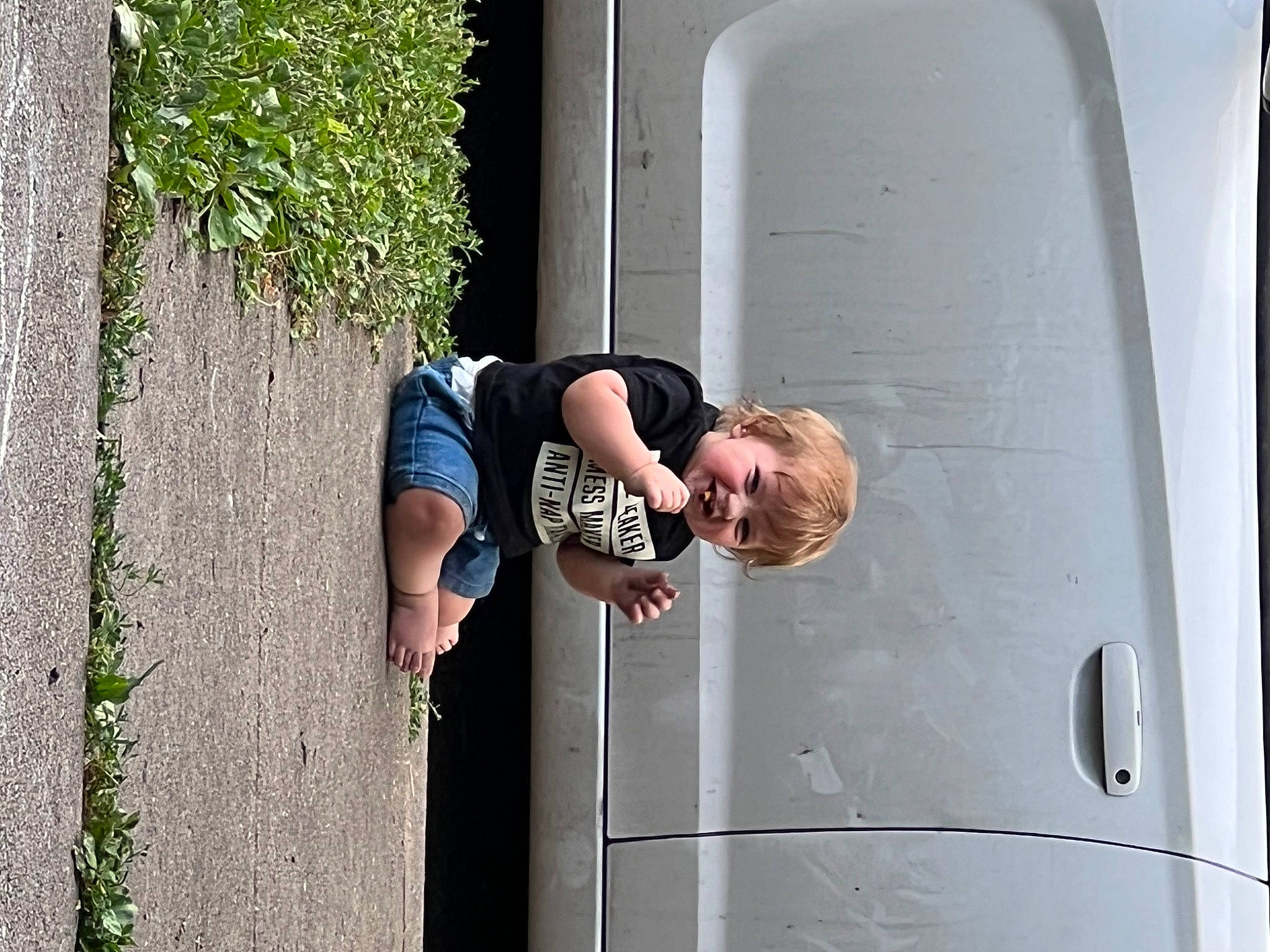 Jaxxon joined the competition — help win amazing prizes! asphalt, automotive_exterior, child, concrete, elbow, fun, gas, joy, leisure, person, plant, recreation, street_fashion, toddler, vehicle_door