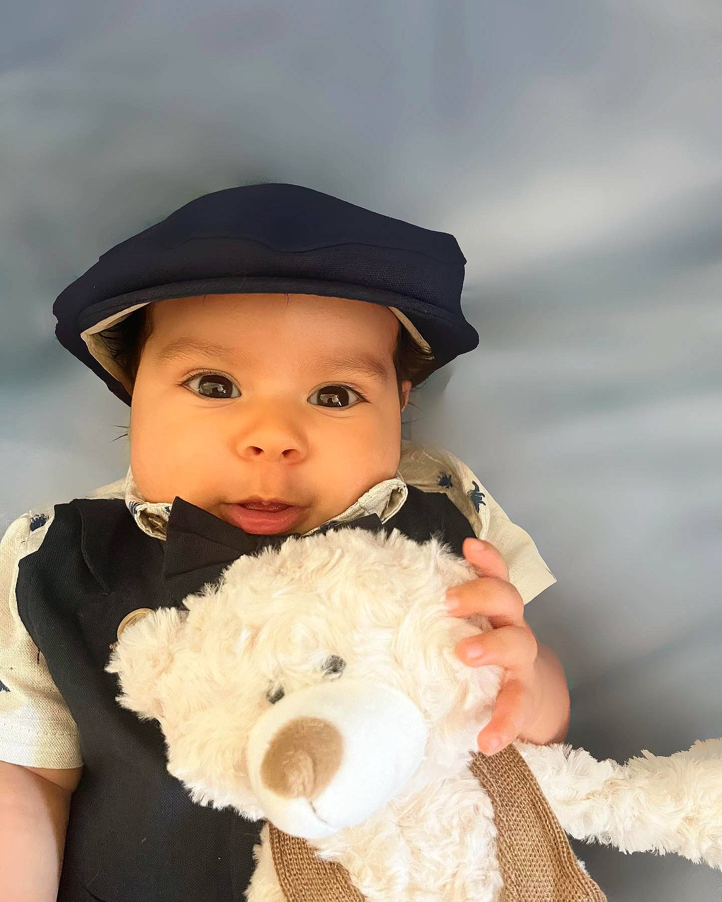 Cyrus is registered to the contest to win money with this photo: baby, baby_toddler_clothing, bow_tie, cap, child, cloud, costume_hat, electric_blue, event, eye, fashion_accessory, flash_photography, fun, happy, hat, headgear, headwear, person, skin, sun_hat