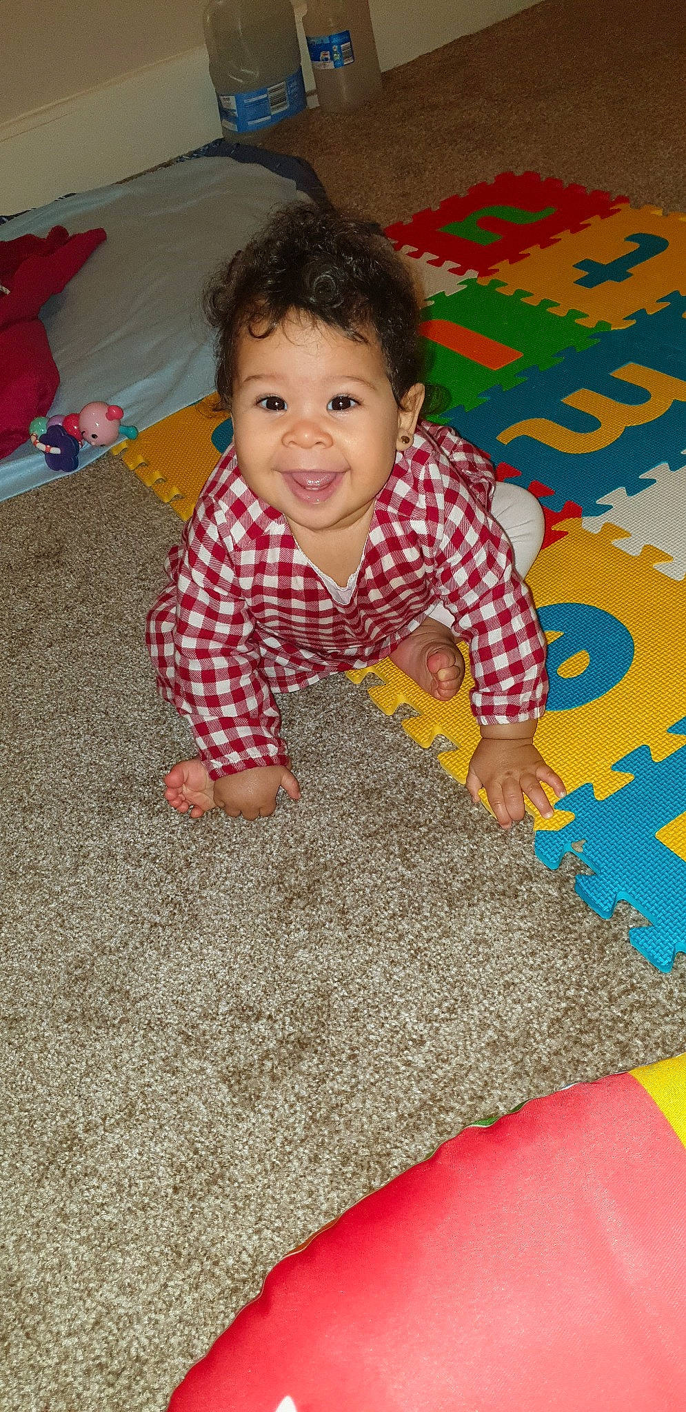 Amilia is registered to the contest to win money with this photo: baby, carpet, child, crawling, floor, flooring, joy, pattern, person, play, playmat, textile, toddler