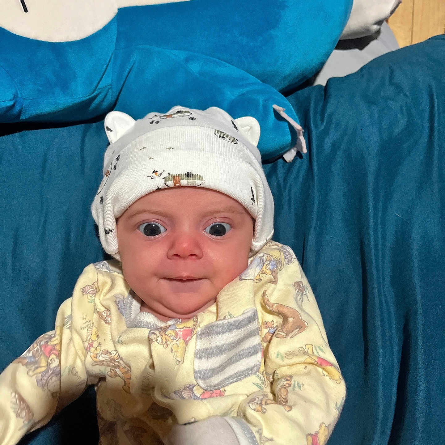 Marazia is registered to the contest to win money with this photo: architecture, baby, building, cap, clothing, couch, cushion, face, furniture, glove, happy, hat, head, homedecor, hospital, newborn, person, photography, portrait, smile