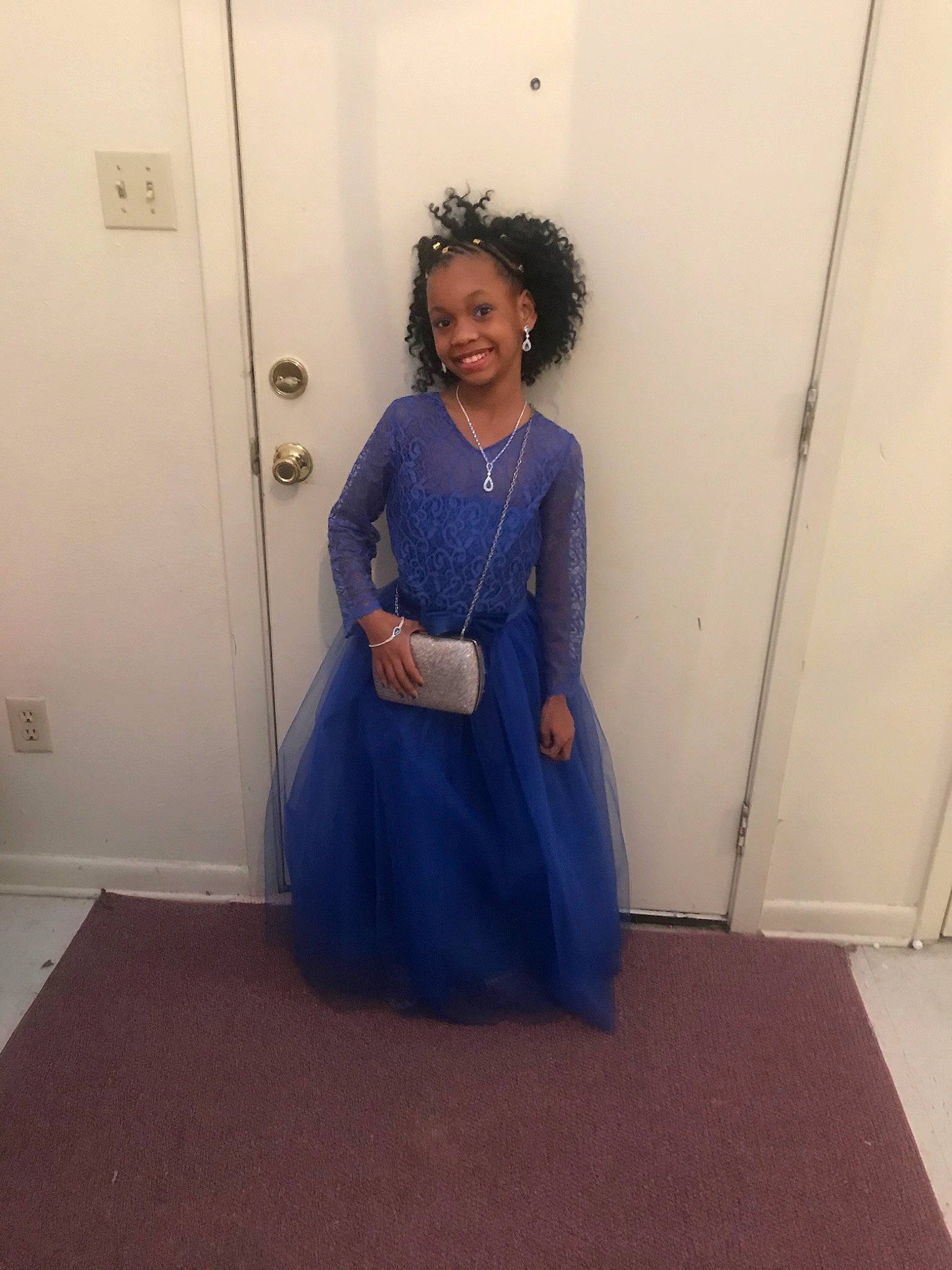 Malayasia is registered to the contest to win money with this photo: blue, dress, floor, flooring, formal_wear, joy, lady, person, shoulder, sitting