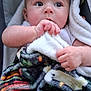 Delanie joined the competition — help win amazing prizes! baby, infant, blanket, hand, face, eyes, curious, soft, cozy, clothing, child, portrait, indoor, cute, skin, newborn, person, comfort, expression, rest