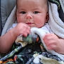Delanie is registered to the contest to win money with this photo: baby, blanket, child, infant, face, hands, soft, colorful, cute, portrait, closeup, young, smiling, indoor, comfort, warm, expression, person, human, head