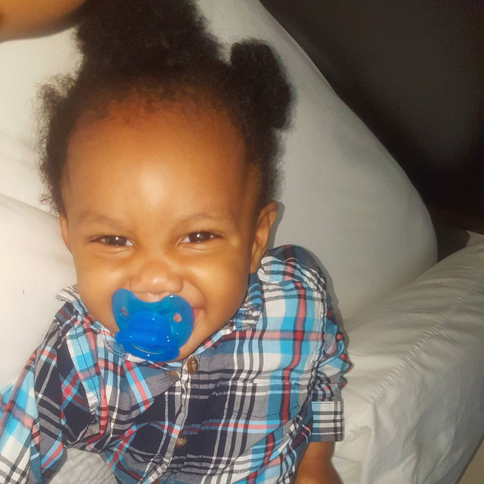 Levi is registered to the contest to win money with this photo: baby, black_hair, blue, cheek, child, design, ear, face, forehead, fun, hair, happy, head, lip, mouth, neck, nose, pattern, person, toddler