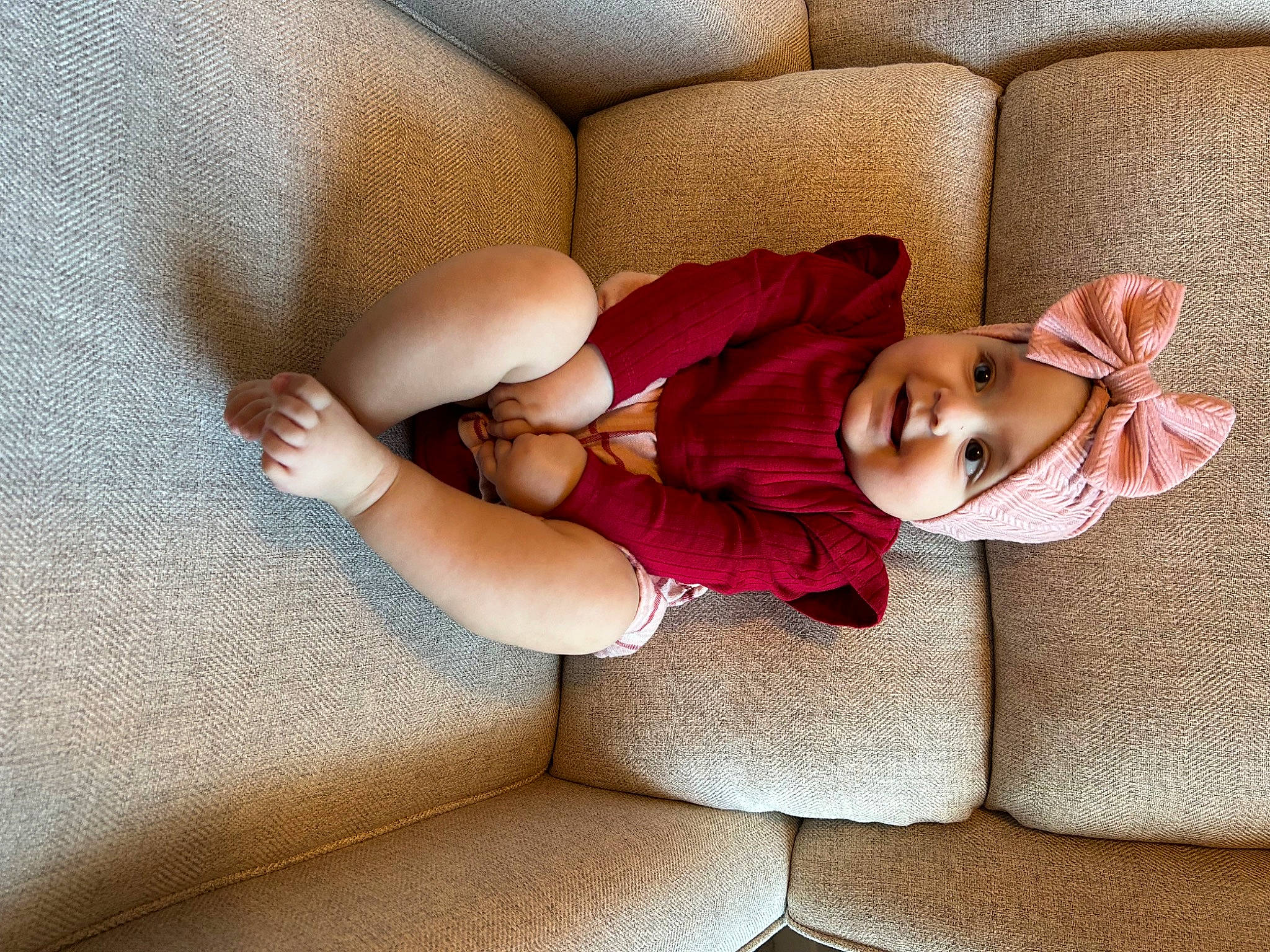 Roslyn joined the competition — help win amazing prizes! baby, baby_sleeping, child, comfort, couch, finger, flooring, furniture, hand, headwear, human_leg, joy, knee, leg, linens, person, sitting, sock, textile, thigh