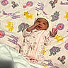 Naomi joined the competition — help win amazing prizes! baby, infant, newborn, blanket, animal_pattern, pink_clothing, hat, laying_down, hand_raised, cute, sleepwear, soft_texture, nursery, child, portrait, adorable, cozy, sleeping, small_hands, fabric