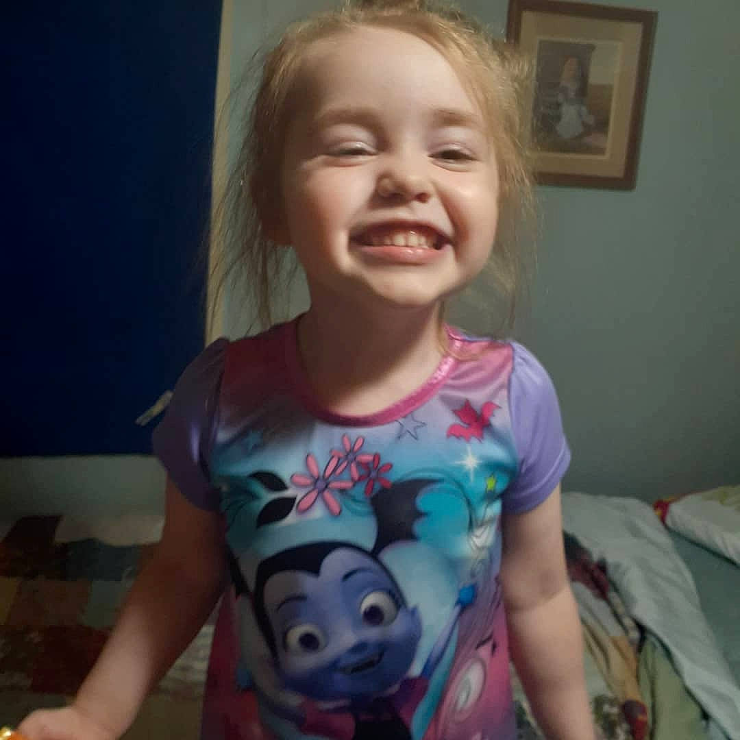 Elaina joined the competition — help win amazing prizes! baby_toddler_clothing, cheek, chest, child, eyelash, iris, joy, laugh, linens, lip, long_sleeved_t_shirt, mouth, neck, organ, person, picture_frame, shoulder, sleeve, toddler, tongue