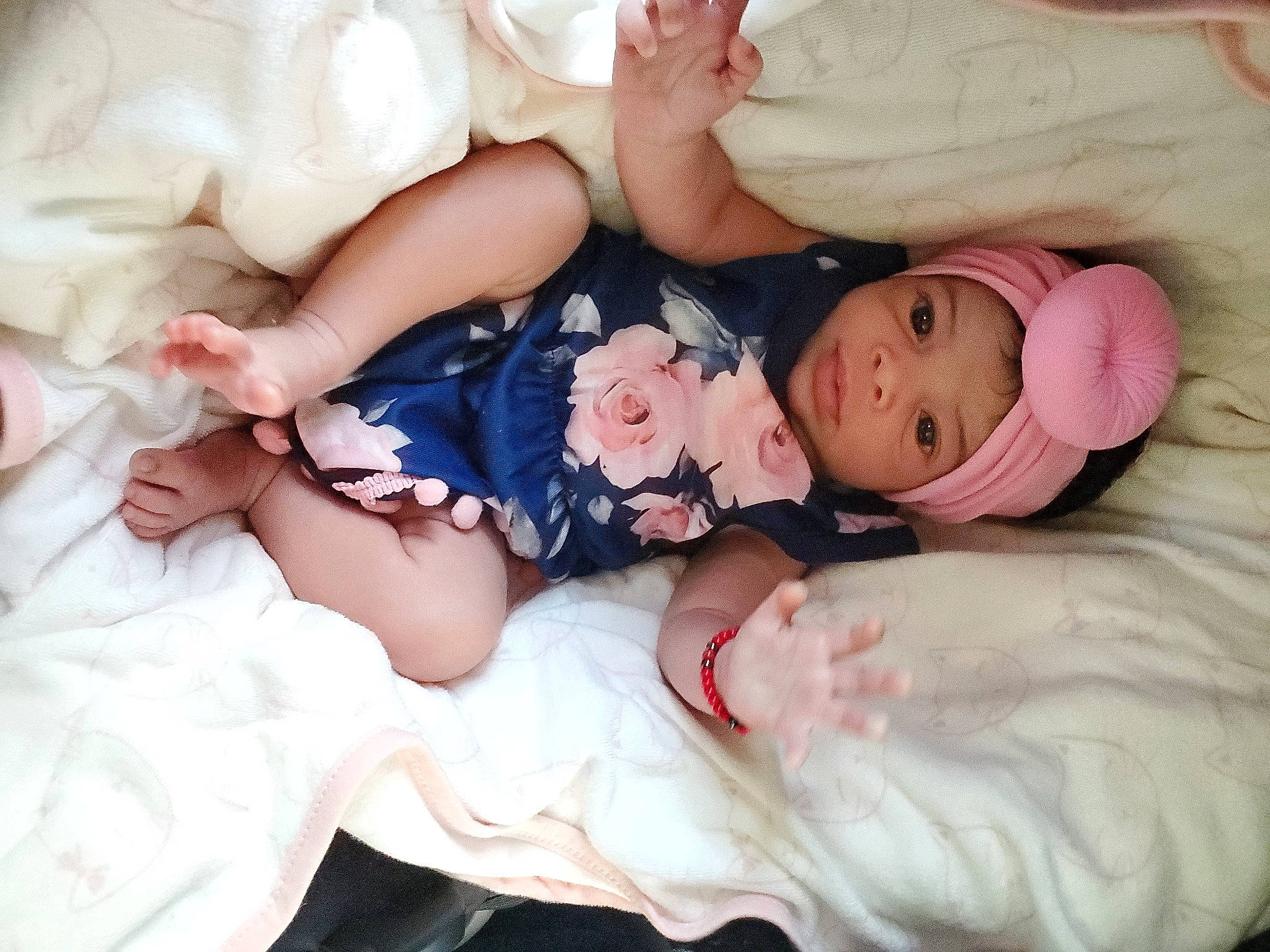 Kaylani is registered to the contest to win money with this photo: baby, baby_sleeping, bedtime, birth, child, happy, headwear, leg, nap, person, pink, sibling, sleep, smile, toddler