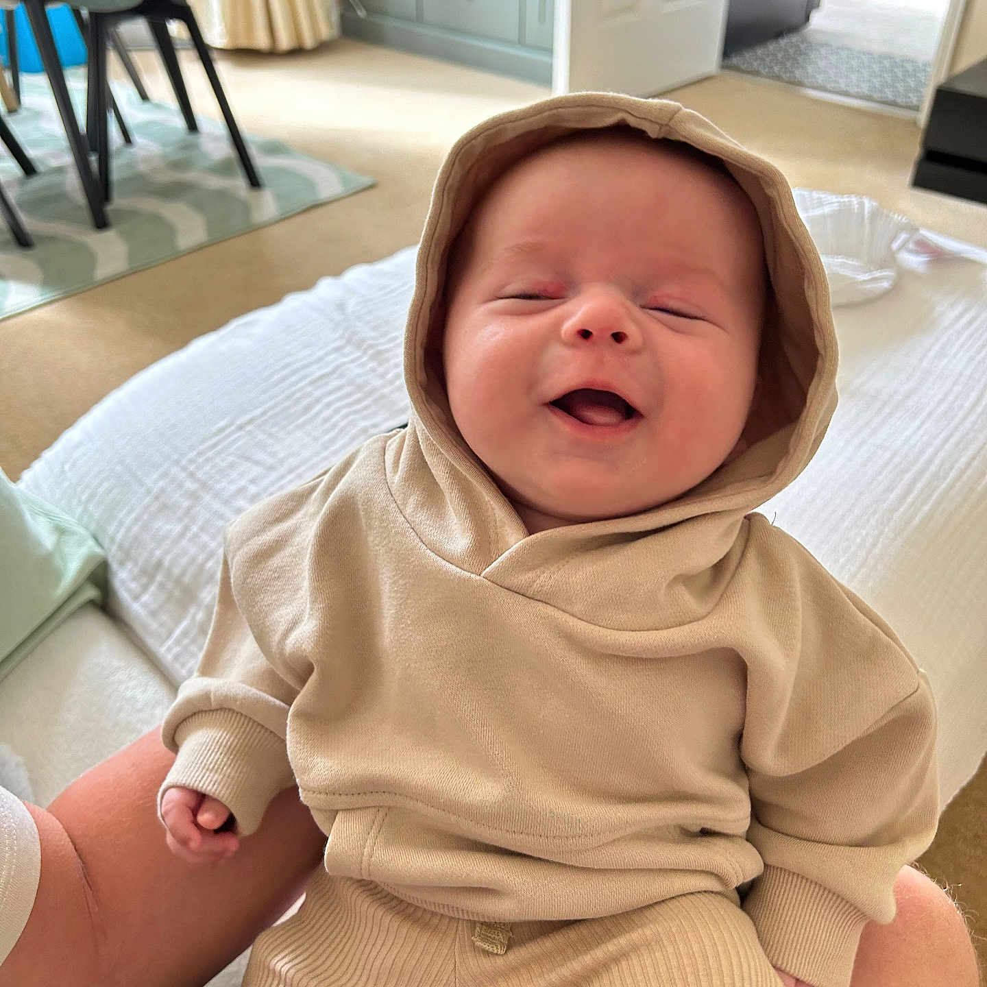 Marlo joined the competition — help win amazing prizes! architecture, baby, babylaughing, bonnet, building, clothing, crying, face, furniture, happy, hat, head, homedecor, hood, newborn, person, photography, portrait, rug, sad