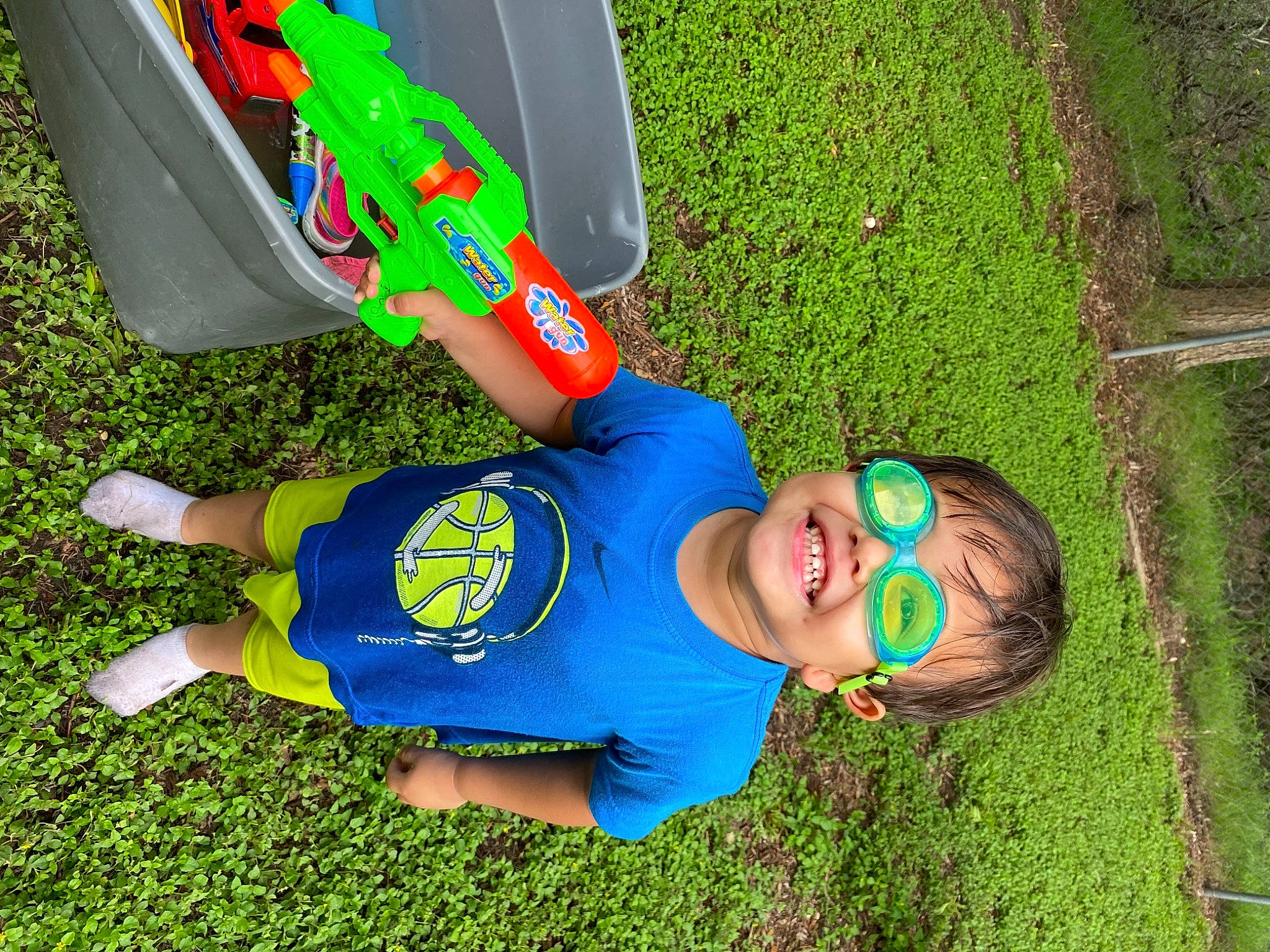 Danny is registered to the contest to win money with this photo: child, electric_blue, fun, grass, grassland, green, happy, hat, joy, lawn, leisure, people_in_nature, person, plant, recreation, shorts, smile, summer, sunglasses, t_shirt