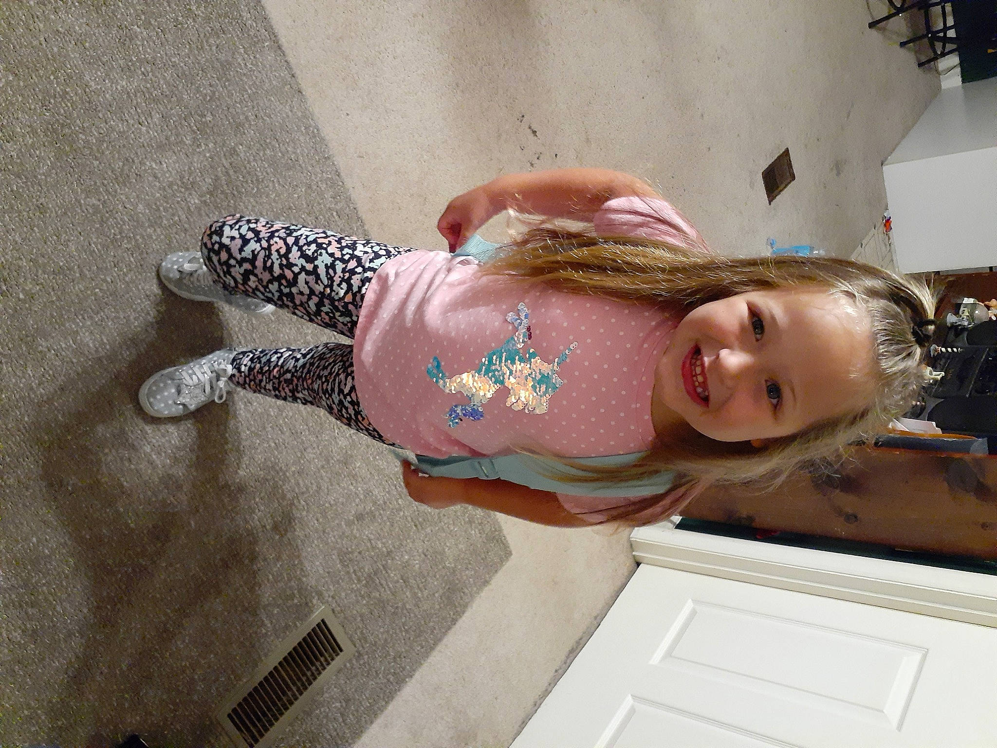 Kacie is registered to the contest to win money with this photo: abdomen, baby_toddler_clothing, child, elbow, fashion_accessory, flesh, flooring, foot, fun, hat, human_leg, joy, knee, pattern, person, smile, thigh, toddler, trunk, waist