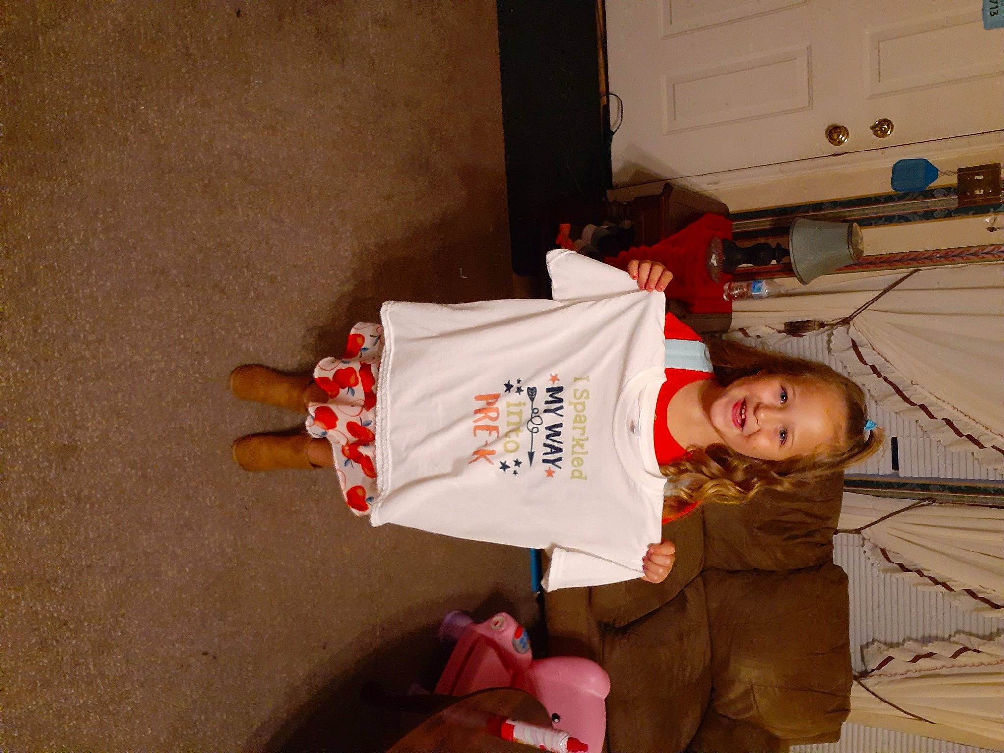 Kacie is registered to the contest to win money with this photo: carmine, child, event, flooring, fun, human_leg, joy, peripheral, person, room, sleeve, thigh, toddler, wood