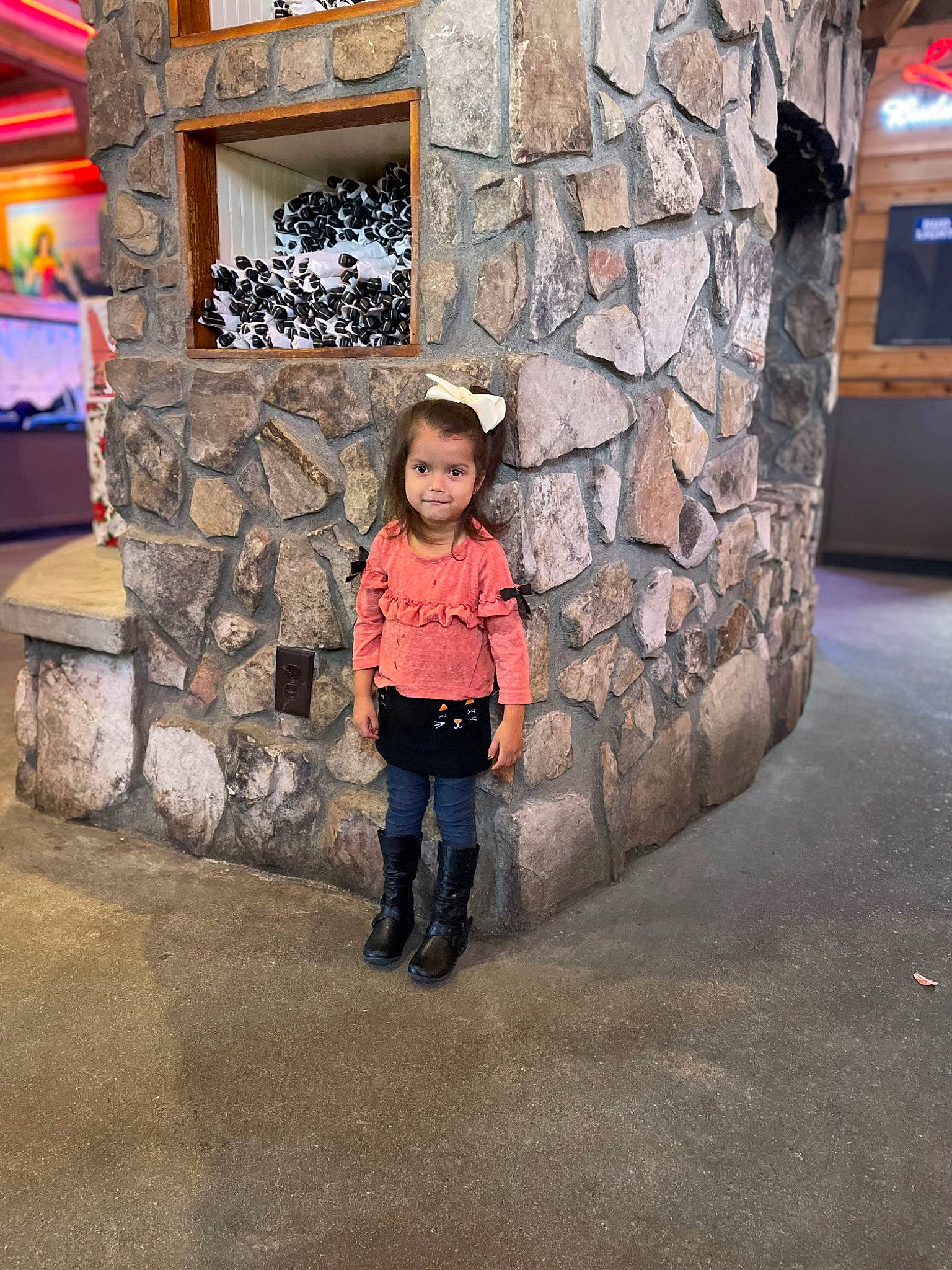 Adriana is registered to the contest to win money with this photo: art, asphalt, cobblestone, denim, flooring, fun, jeans, leisure, pattern, people, person, road_surface, smile, standing, temple, tints_and_shades, toddler, travel, tree, visual_arts