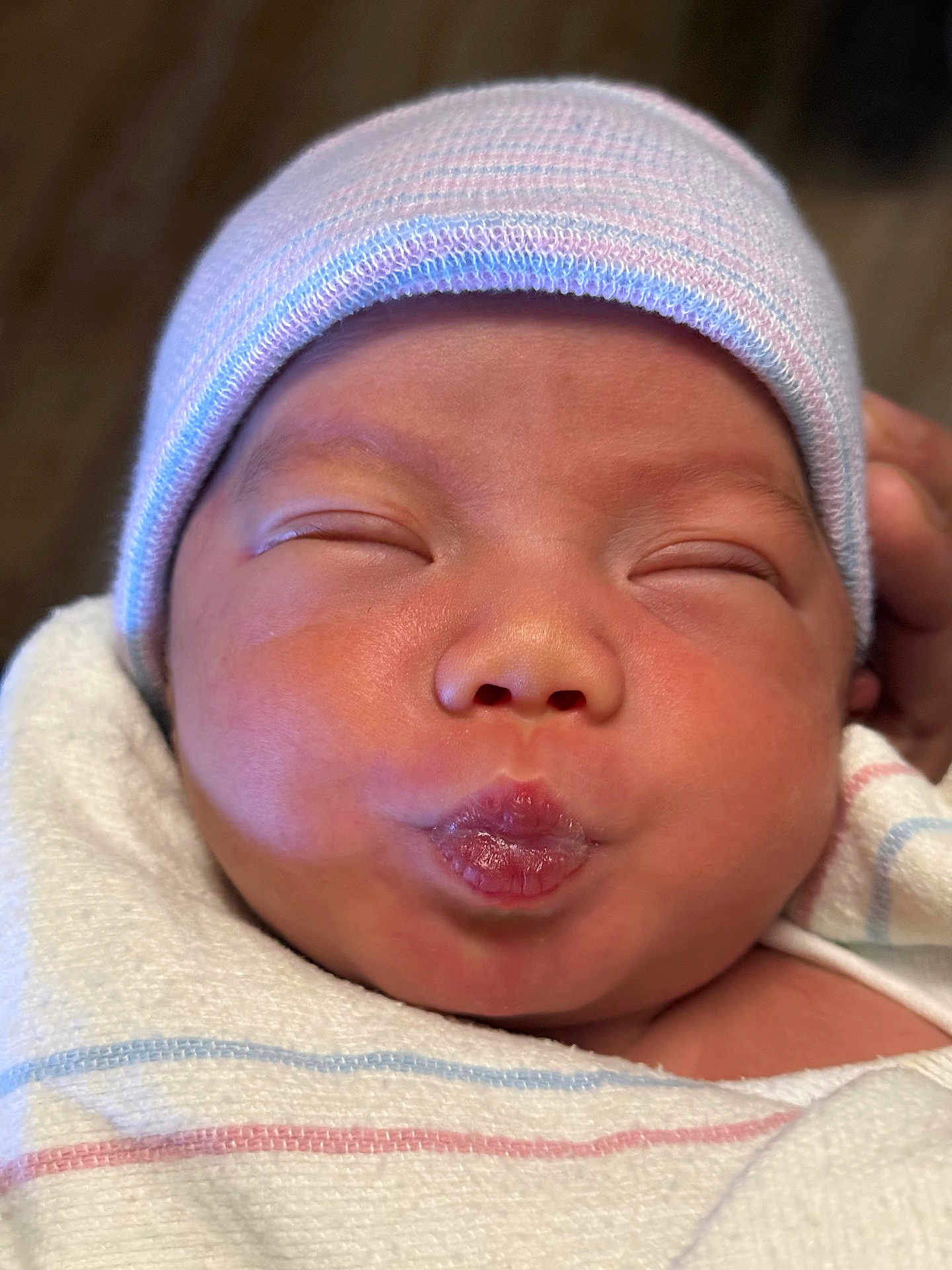 Nathaniel joined the competition — help win amazing prizes! baby, newborn, face, hat, blanket, wrapped, cute, infant, puckered_lips, sleeping, skin, closeup, adorable, child, soft, newborn_baby, headwear, person, peaceful, tiny