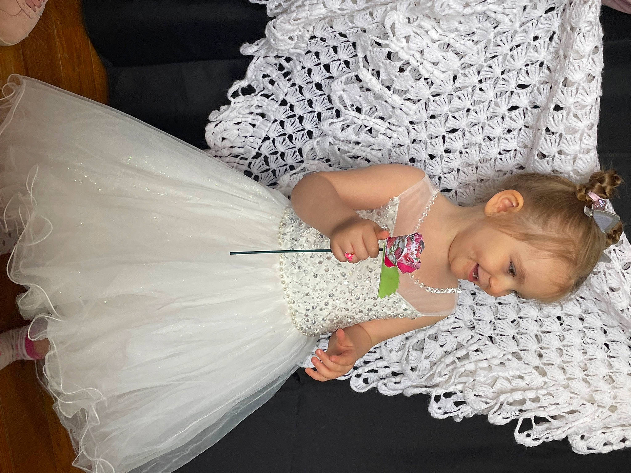 Daya participe au concours pour gagner de l'argent avec cette photo : arm, baby_toddler_clothing, bridal_accessory, bridal_clothing, bridal_party_dress, comfort, dress, embellishment, facial_expression, finger, fun, hairstyle, hand, happy, headgear, human_body, joint, joy, person, textile