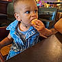 Adonis is registered to the contest to win money with this photo: baby, bodypart, bread, computerhardware, couch, eating, electronics, face, finger, food, furniture, hand, hardware, head, indoors, monitor, person, screen, table, tv