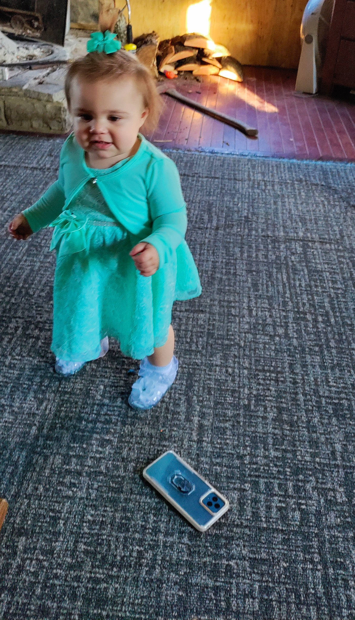 Addilynn joined the competition — help win amazing prizes! asphalt, baby, baby_toddler_clothing, child, communication_device, electric_blue, floor, flooring, fun, leisure, mobile_device, mobile_phone, pattern, person, portable_communications_device, sitting, sleeve, standing, telephony, toddler
