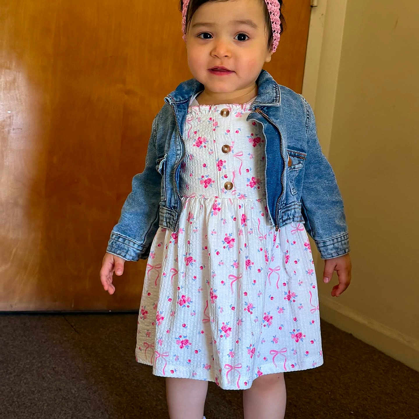 Jaizaelee joined the competition — help win amazing prizes! toddler, child, girl, indoor, dress, floral_pattern, denim_jacket, headband, flower_accessory, white_shoes, socks, carpet, door, wall, standing, portrait, cute, young_child, fashion, smiling