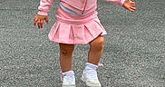 Jaizaelee joined the competition — help win amazing prizes! toddler, child, pink_clothing, headband, flower, smiling, walking, outdoor, pavement, sneakers, white_shoes, cute, happy, young_child, playful, shorts, jacket, casual_wear, person, fun