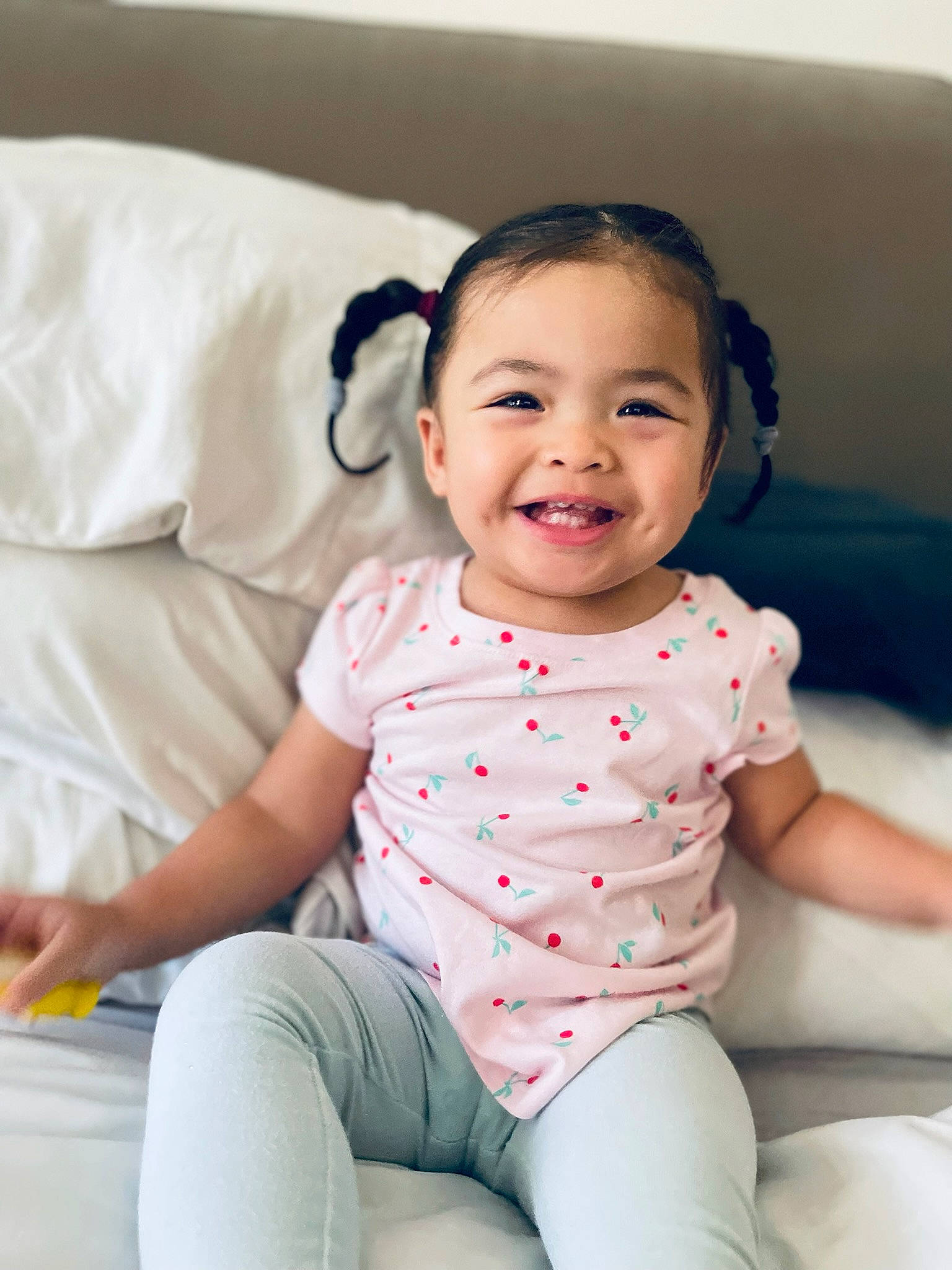 Eleanor is registered to the contest to win money with this photo: arm, baby_toddler_clothing, cheek, chin, comfort, eye, face, facial_expression, flash_photography, happy, head, iris, joint, joy, lip, neck, person, pink, shoulder, skin