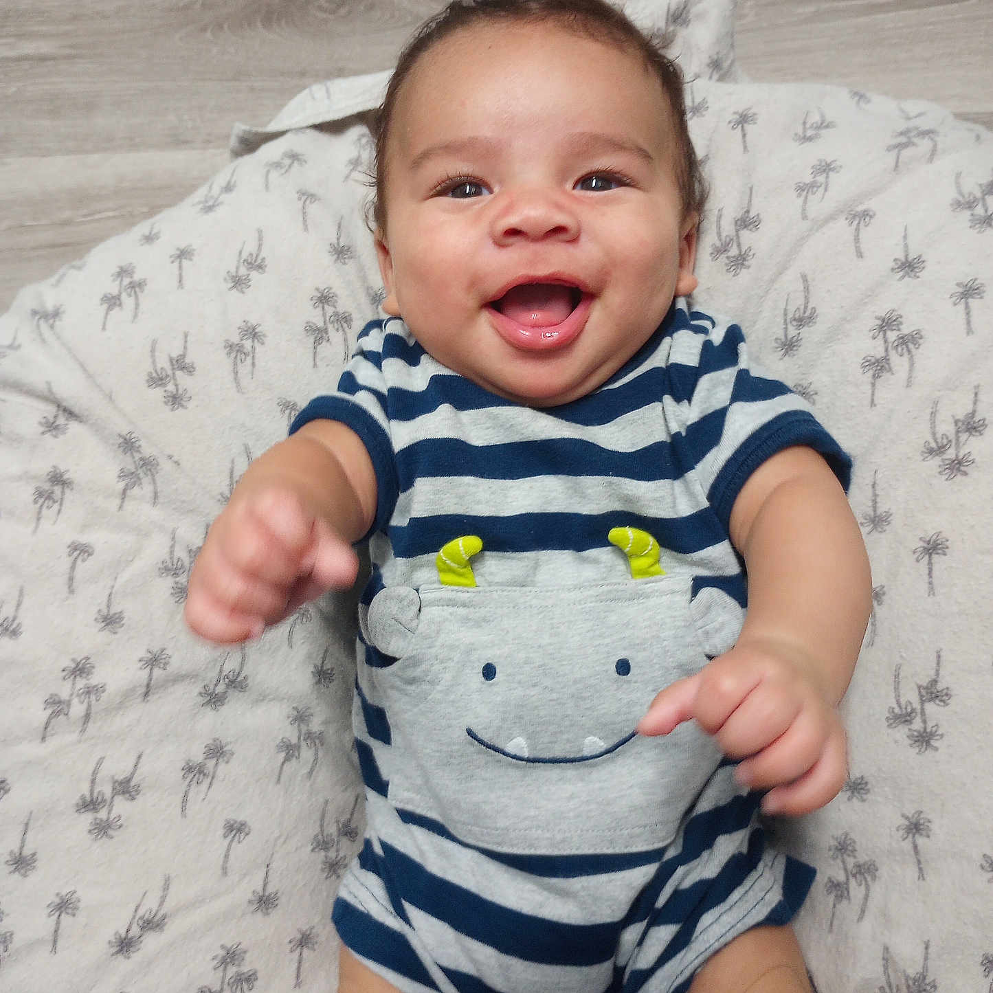 Zayden joined the competition — help win amazing prizes! baby, babylaughing, bed, bodypart, clothing, cushion, face, finger, furniture, hand, happy, head, homedecor, laughing, newborn, pants, person, photography, portrait, smile