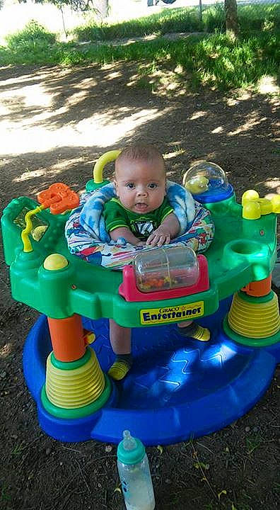 Christopher is registered to the contest to win money with this photo: backyard, child, outdoor_play_equipment, play, playground, public_space, toddler, toy