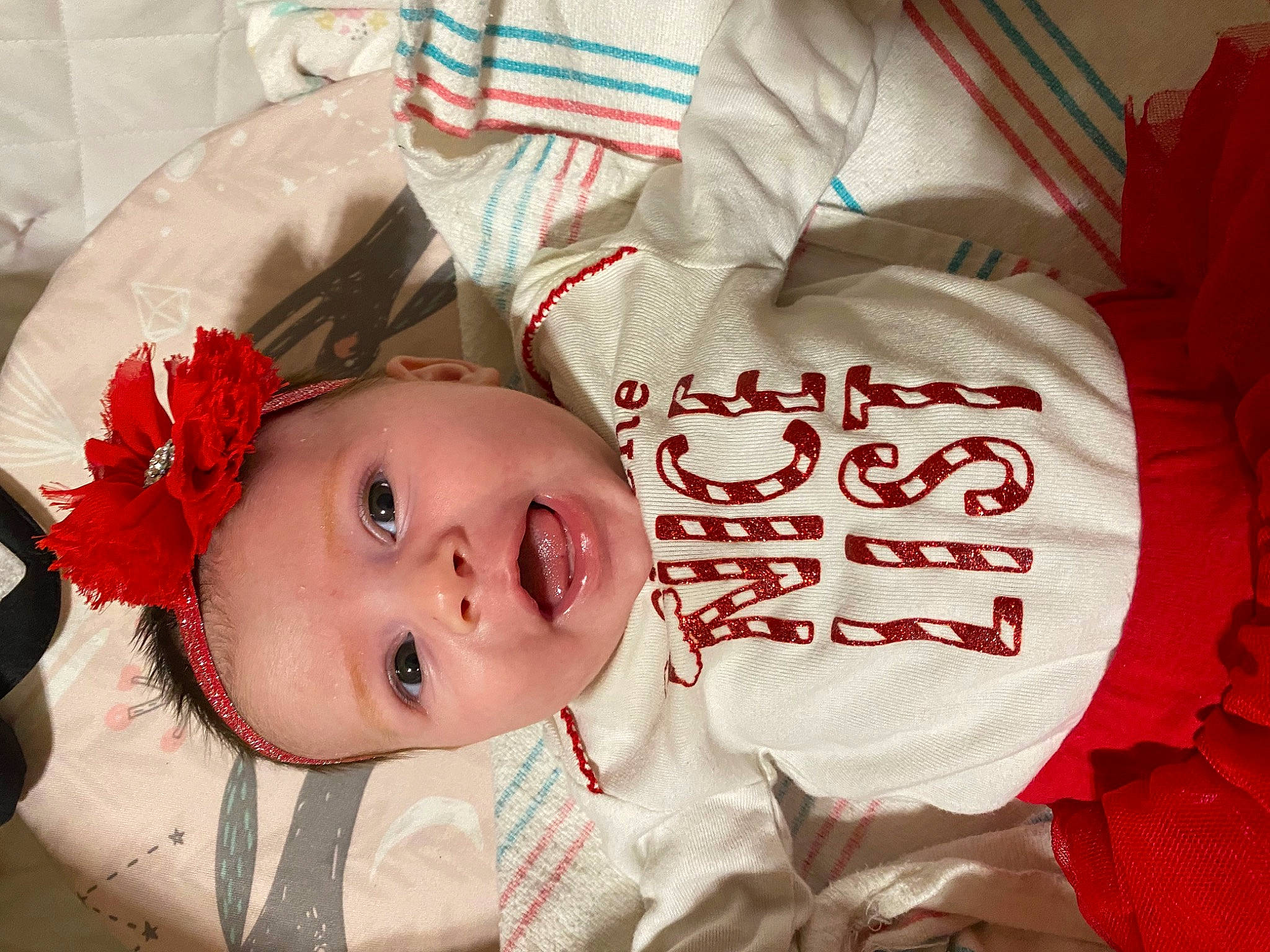 Adilynn joined the competition — help win amazing prizes! baby, baby_products, baby_toddler_clothing, carmine, cheek, child, comfort, eyelash, happy, headwear, linens, lip, person, red, room, sleeve, toddler