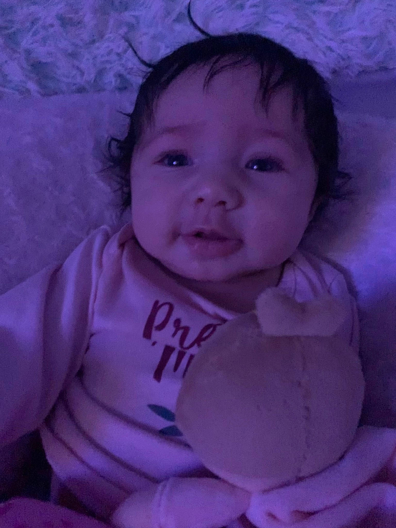 Amelia is registered to the contest to win money with this photo: azure, baby, baby_toddler_clothing, cheek, chin, eyebrow, flash_photography, hairstyle, happy, human_body, iris, lip, mouth, nose, person, pink, purple, skin, sleeve, smile