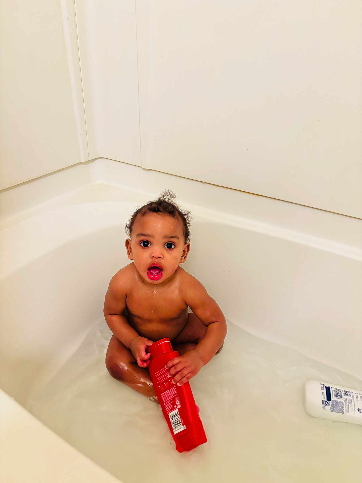 Kamai joined the competition — help win amazing prizes! baby, bathing, bathroom, bathtub, bodypart, bottle, face, finger, hand, happy, head, indoors, mouth, person, photography, portrait, room, shaker, smile, tub