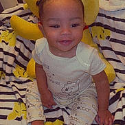 Jakodah joined the competition — help win amazing prizes! toddler, child, smiling, braids, stuffed_bear, yellow, blanket, striped, cute, happy, indoors, pajamas, feet, hands, face, sitting, cozy, plush, soft, childhood