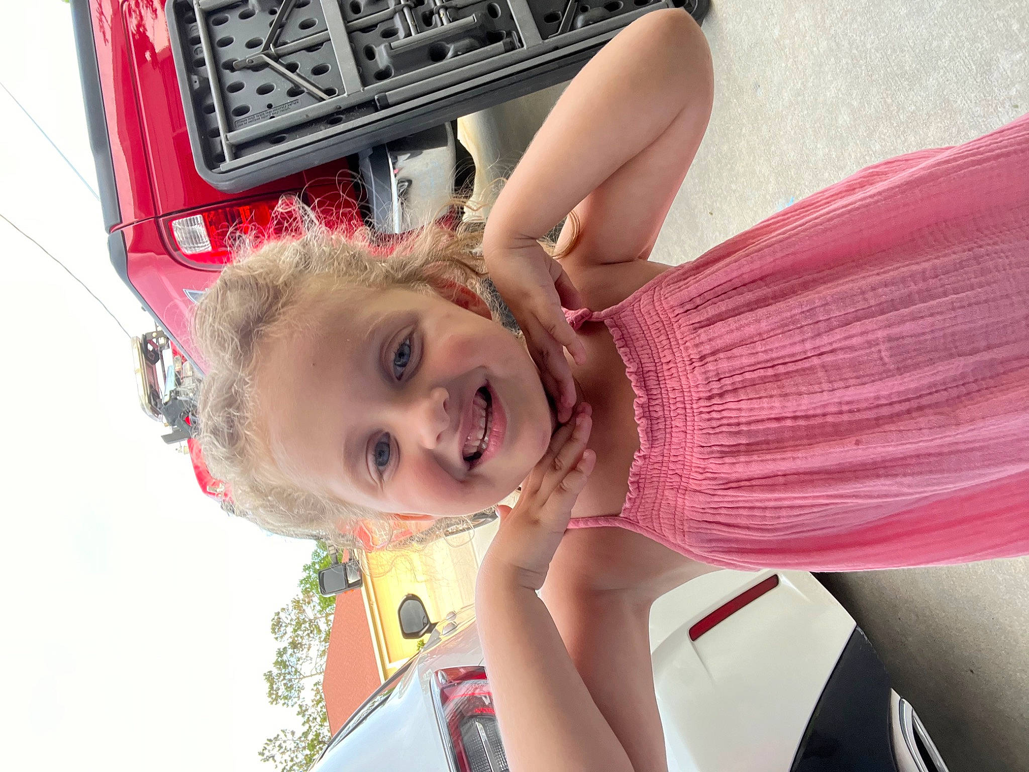 Sailor is registered to the contest to win money with this photo: abdomen, beauty, blond, child, eyewear, fun, happy, human_leg, joint, joy, leisure, magenta, person, pink, red, skin, sky, smile, sunglasses, thigh