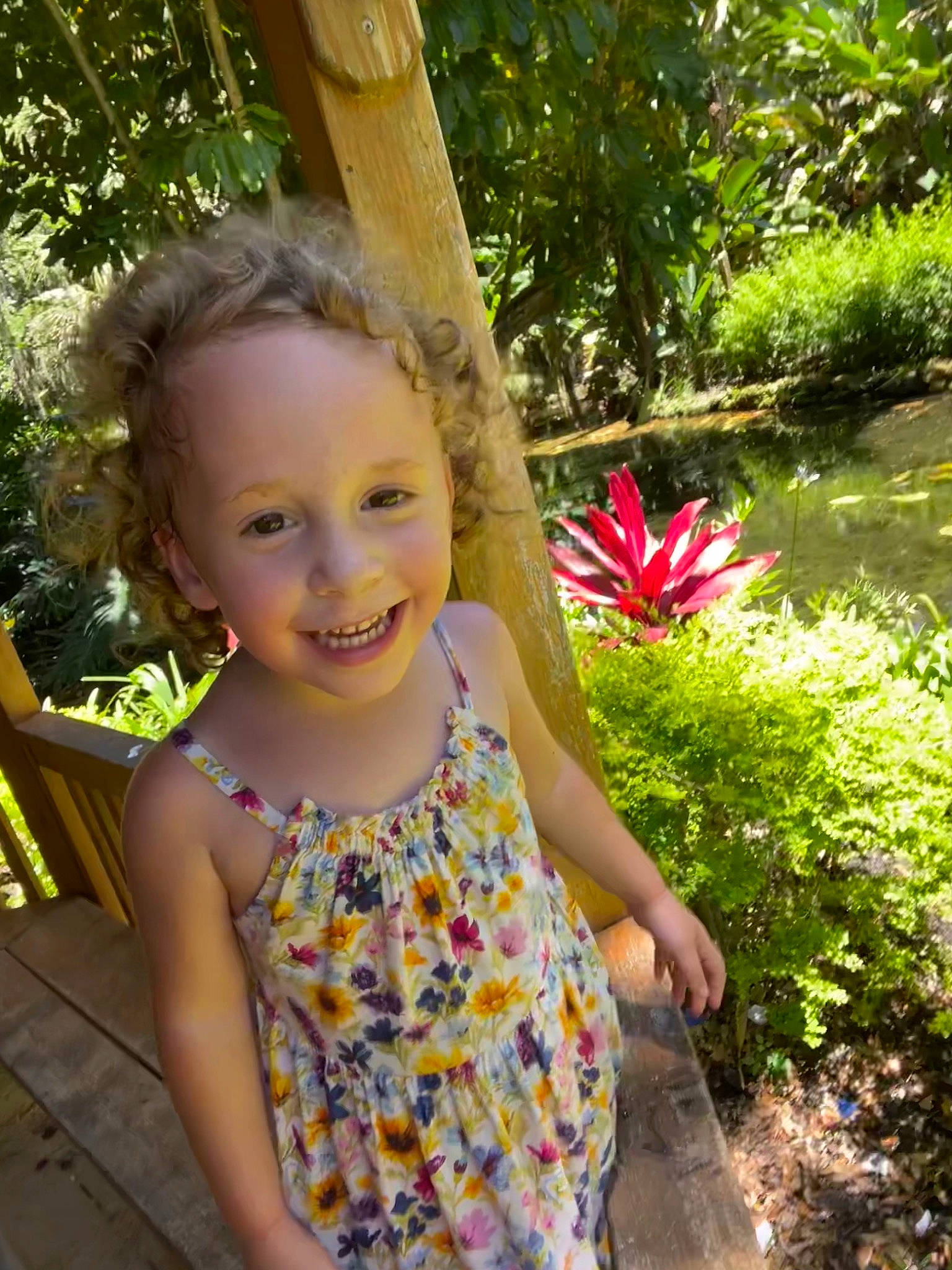 Zoe is registered to the contest to win money with this photo: botany, flower, grass, green, hairstyle, happy, head, joy, leaf, leisure, morning, natural_environment, people_in_nature, person, pink, plant, smile, summer, sunlight, terrestrial_plant