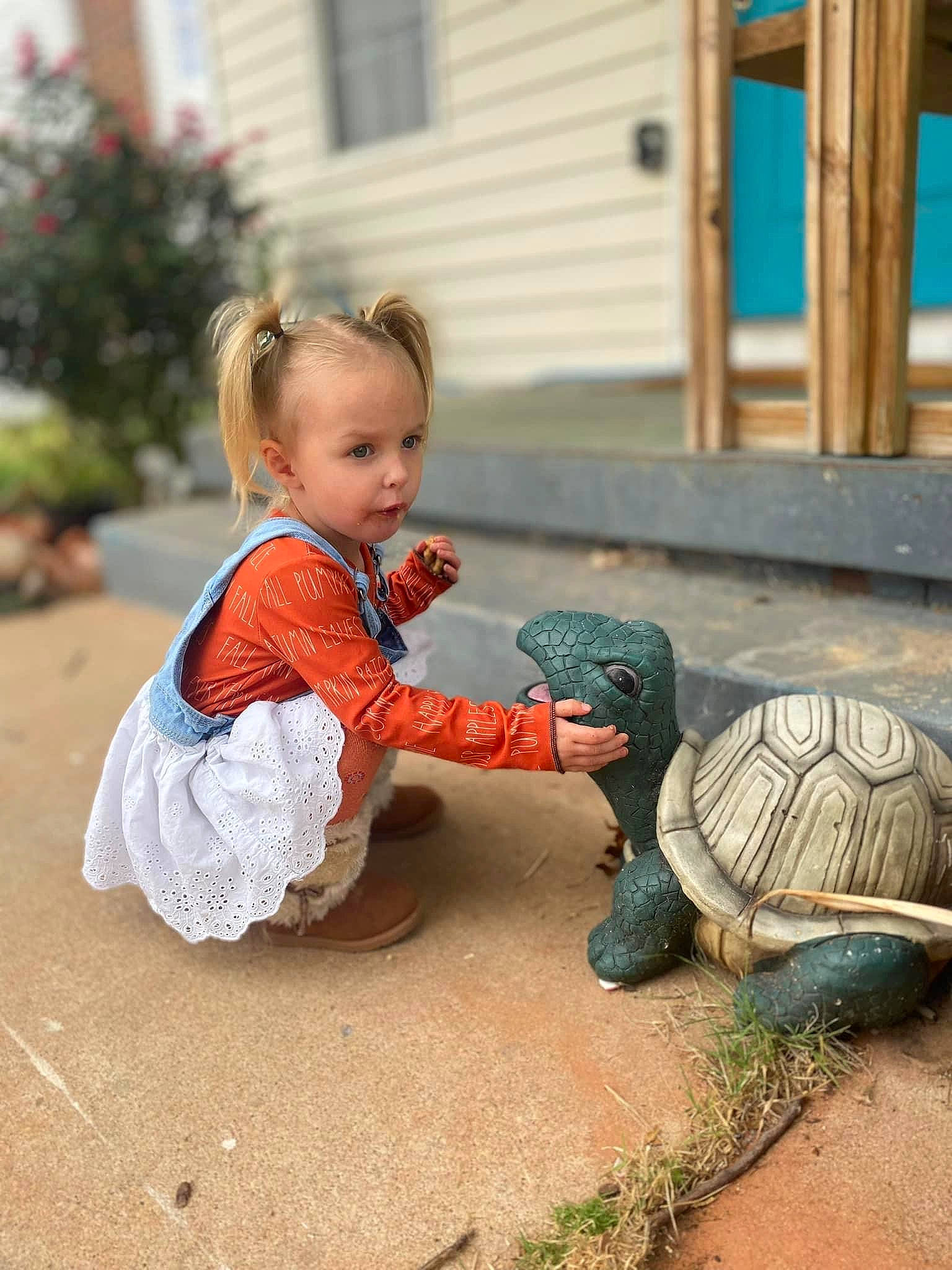 Leti is registered to the contest to win money with this photo: baby, baby_toddler_clothing, child, flooring, fun, grass, happy, lawn_ornament, leisure, people_in_nature, person, plant, pond_turtle, reptile, sitting, soil, toddler, tortoise, turtle, vacation