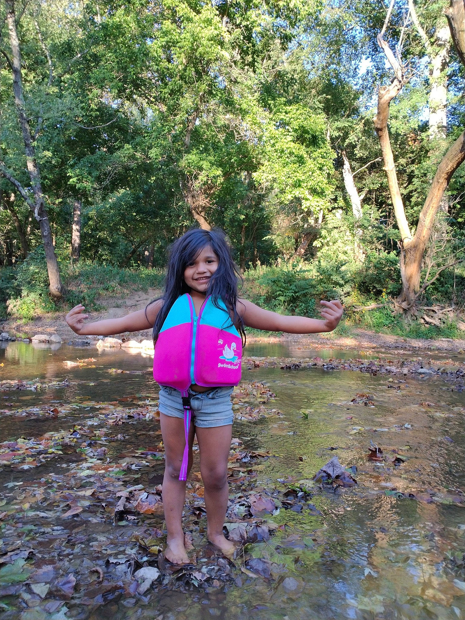 Miriam joined the competition — help win amazing prizes! body_of_water, branch, electric_blue, fluvial_landforms_of_streams, forest, grass, joy, jungle, lake, landscape, leisure, natural_landscape, people_in_nature, person, plant, terrestrial_plant, thigh, tree, trunk, vegetation