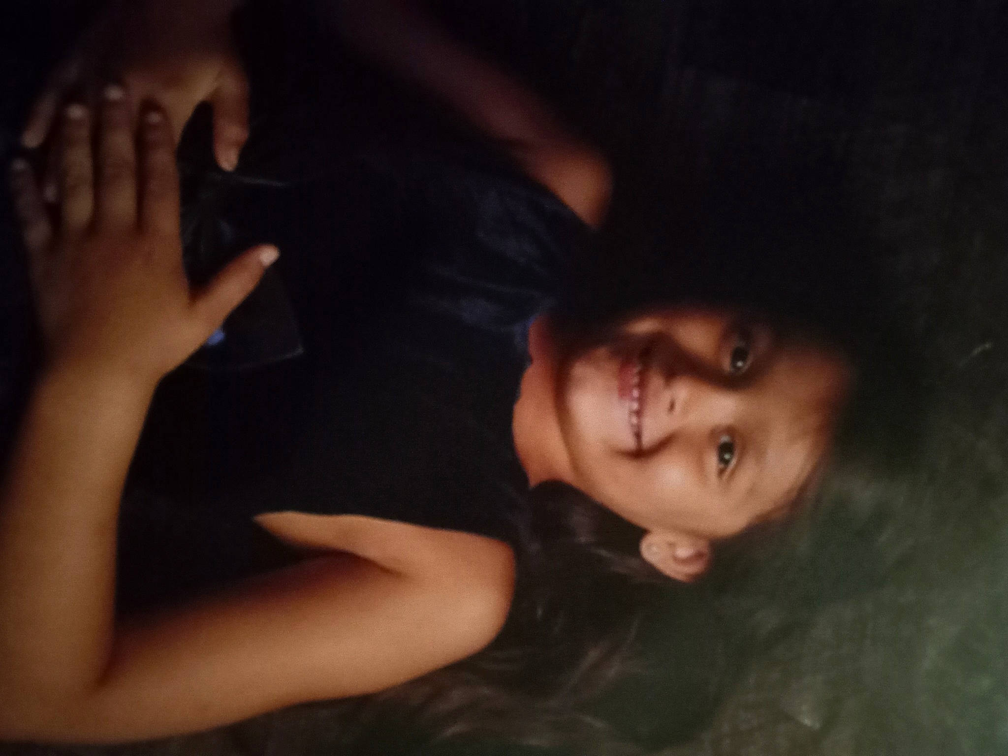 Jazmine is registered to the contest to win money with this photo: black_hair, brown_hair, chest, child, darkness, elbow, eyelash, finger, flash_photography, fun, gesture, happy, human_leg, joy, long_hair, midnight, mouth, nose, person, room