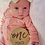 baby, infant, one_month, headband, bow, pink_clothing, blanket, wooden_sign, portrait, cute, newborn, lying_down, soft_texture, child, baby_girl, hand, face, eyes, indoors, celebration