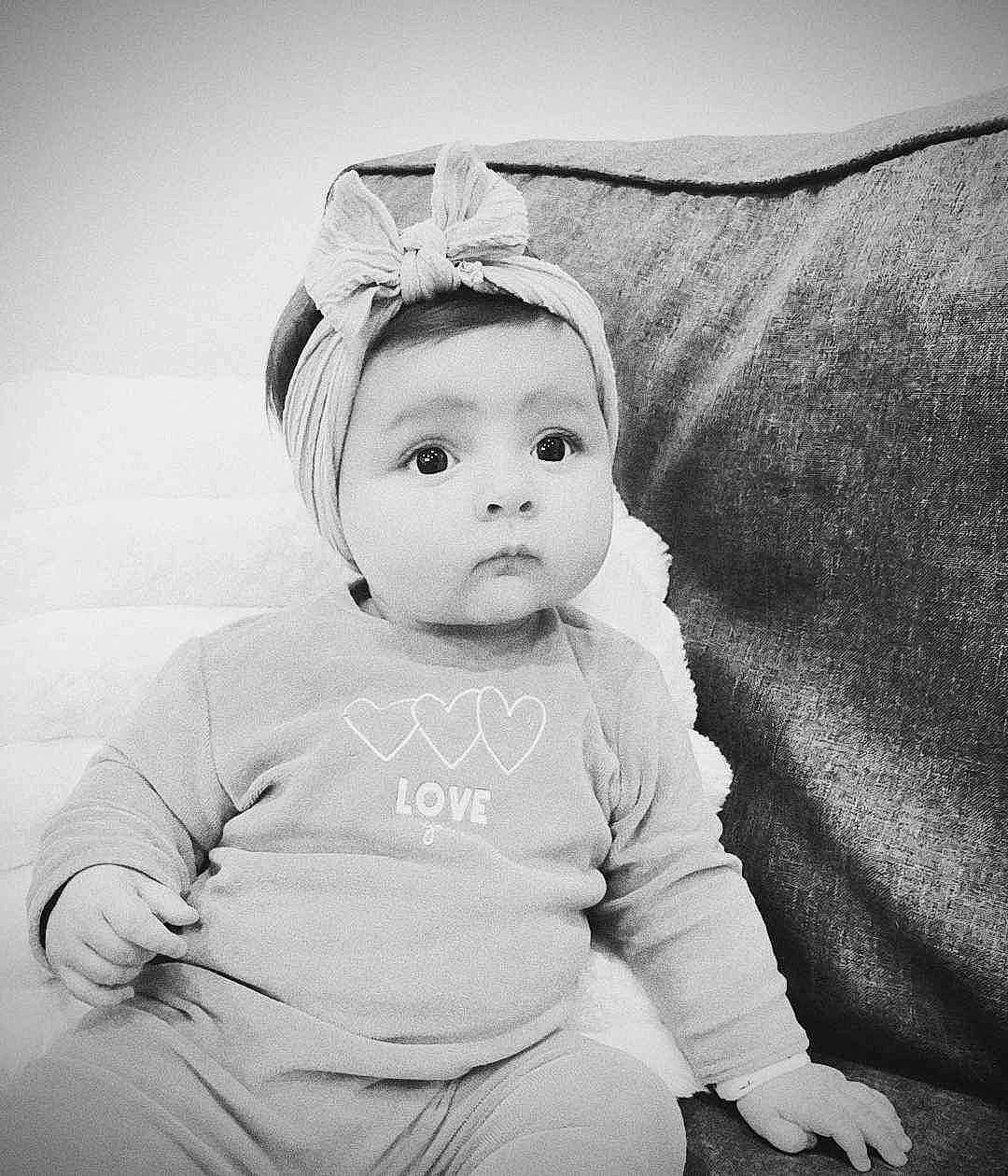 Kiara participe au concours pour gagner de l'argent avec cette photo : baby, baby_toddler_clothing, cheek, child, comfort, couch, eyelash, fashion_accessory, flash_photography, gesture, happy, human_body, monochrome, monochrome_photography, person, portrait_photography, sitting, sleeve, stock_photography, style