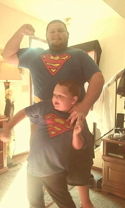 Chad is registered to the contest to win money with this photo: abdomen, arm, fun, hip, joint, muscle, outerwear, person, product, shoulder, standing, t_shirt, textile, trunk