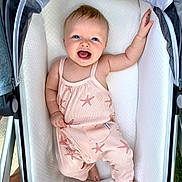 Sienna is registered to the contest to win money with this photo: baby, babylaughing, bed, clothing, crib, face, furniture, happy, head, infantbed, pajamas, person, photography, portrait