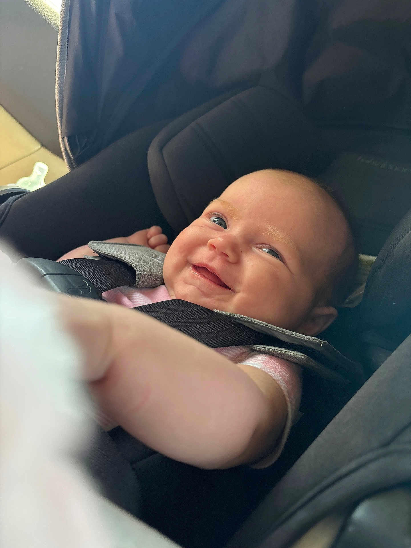 Emersyn is registered to the contest to win money with this photo: baby, car_seat, child, smile, happy, seatbelt, infant, person, safety, straps, cute, indoors, closeup, head, face, skin, clothing, arm, seat, baby_carrier