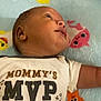 Bacari joined the competition — help win amazing prizes! baby, blanket, child, clothing, comfort, cute, duck, expression, face, head, indoor, infant, lying_down, onesie, pattern, portrait, sleepwear, soft, starfish, young
