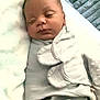 Bacari joined the competition — help win amazing prizes! baby, blanket, child, closeup, comfort, cozy, cushion, face, head, indoors, infant, mittens, newborn, peaceful, portrait, relax, rest, sleeping, soft, swaddle
