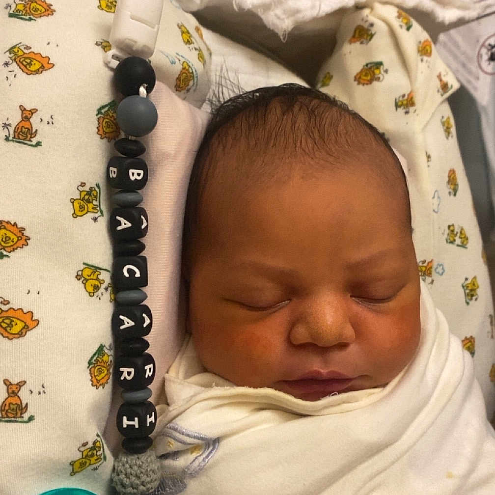 Bacari joined the competition — help win amazing prizes! animal_print, baby, blanket, child, closeup, cozy, cute, indoors, infant, newborn, nursery, pacifier, patterned_pillow, peaceful, portrait, resting, sleep, sleeping, soft, swaddled