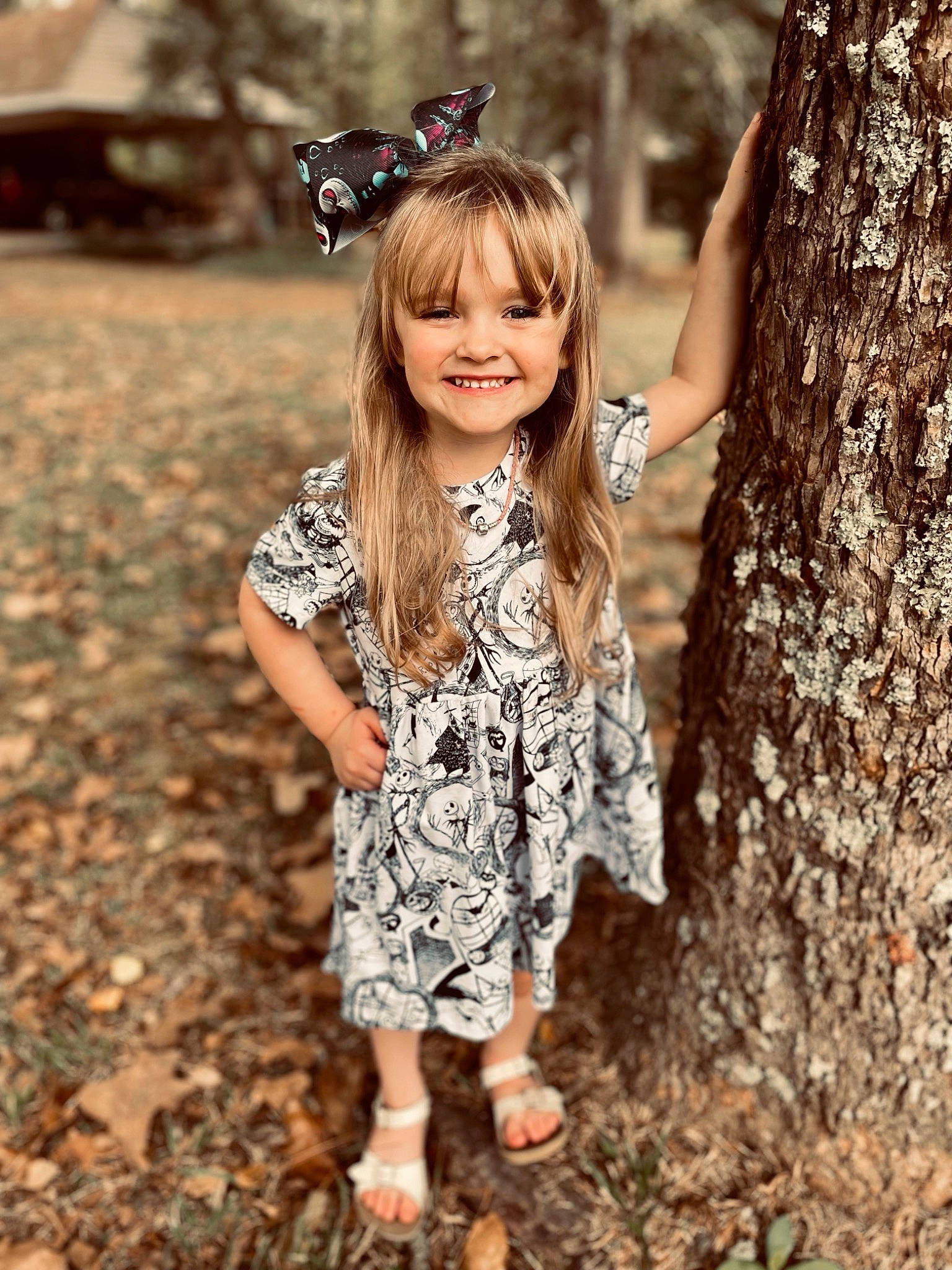 Ryleigh is registered to the contest to win money with this photo: dress, eye, face, facial_expression, grass, hair, happy, iris, joy, leaf, nature, outerwear, people_in_nature, person, photograph, plant, shoulder, sleeve, smile, street_fashion