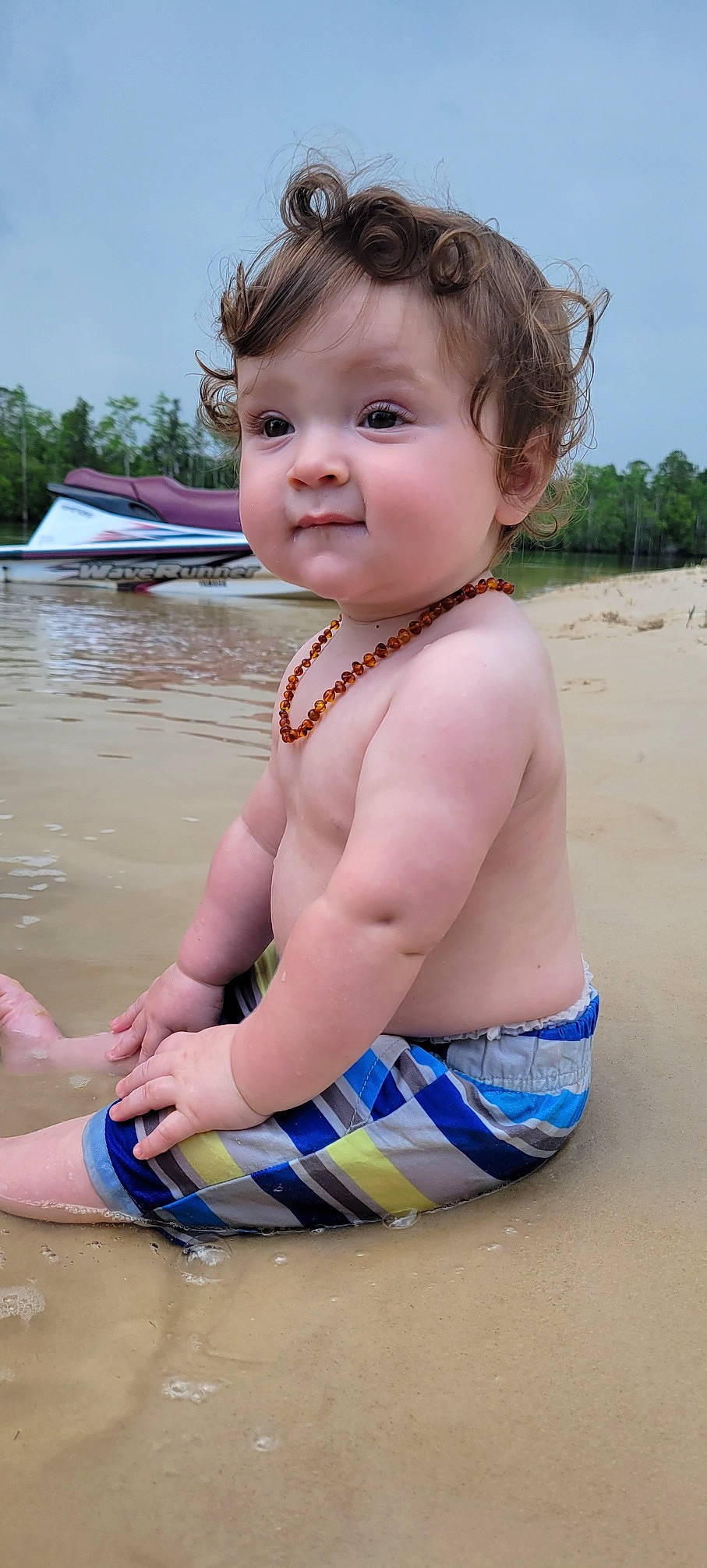 Jasper is registered to the contest to win money with this photo: bathing, beach, blond, chest, child, fun, goggles, hair, happy, leisure, neck, person, skin, sky, summer, sunglasses, swimwear, toddler, tree, trunk