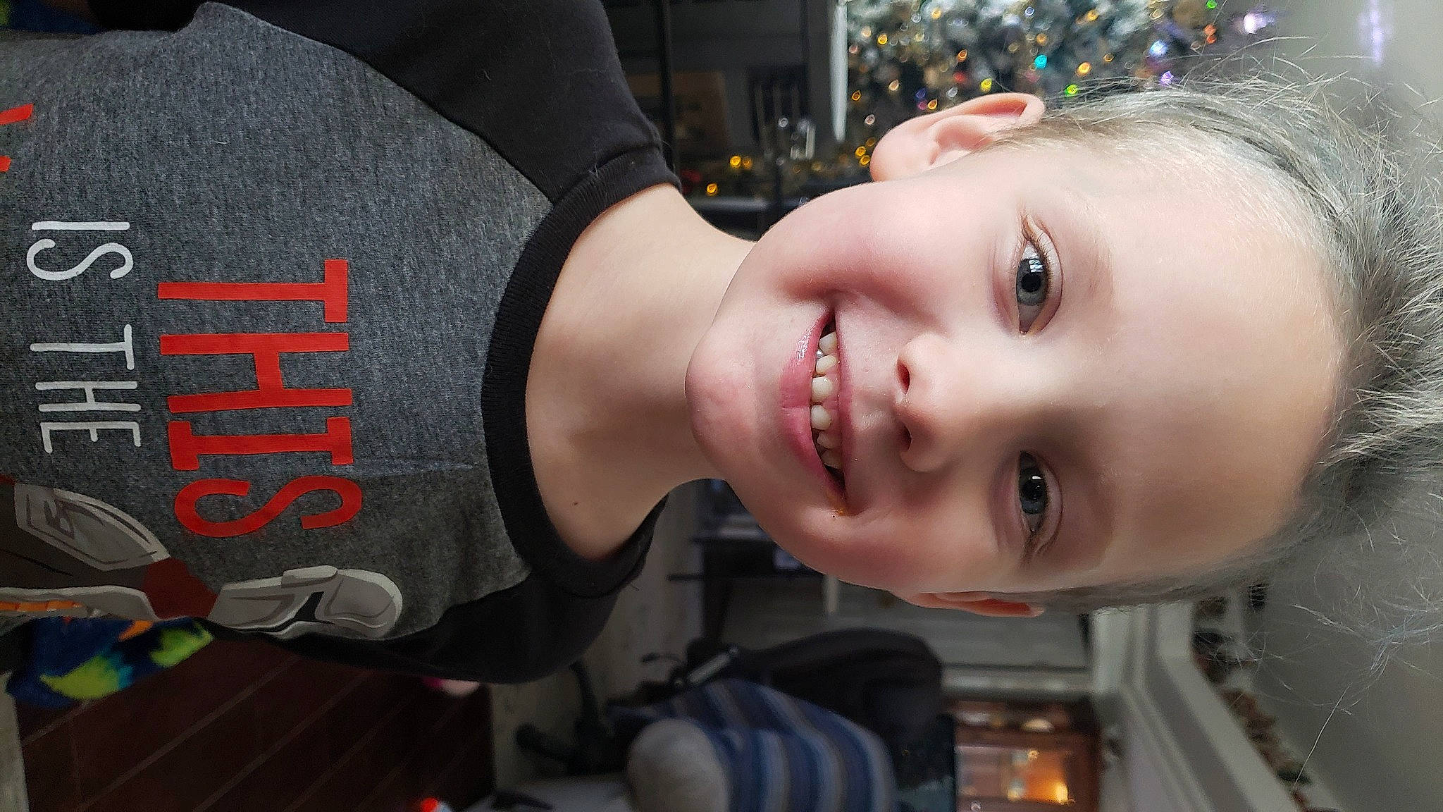 Merlin is registered to the contest to win money with this photo: black_hair, brown_hair, cheek, cool, ear, eyelash, fashion, flash_photography, forehead, fun, hairstyle, happy, jaw, joy, lip, mouth, neck, nose, people, person