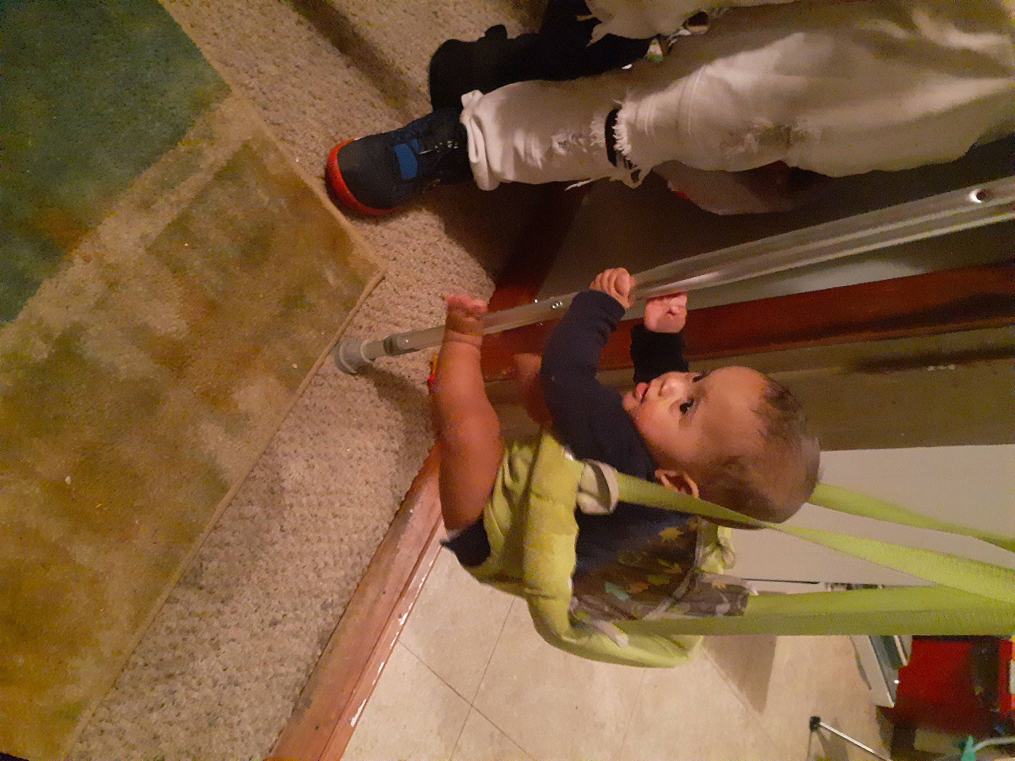 Jesiah is registered to the contest to win money with this photo: concrete, elbow, flooring, foot, fun, human_leg, joint, knee, leisure, outdoor_shoe, pattern, person, plaster, shorts, thigh, walking_shoe, white, wood