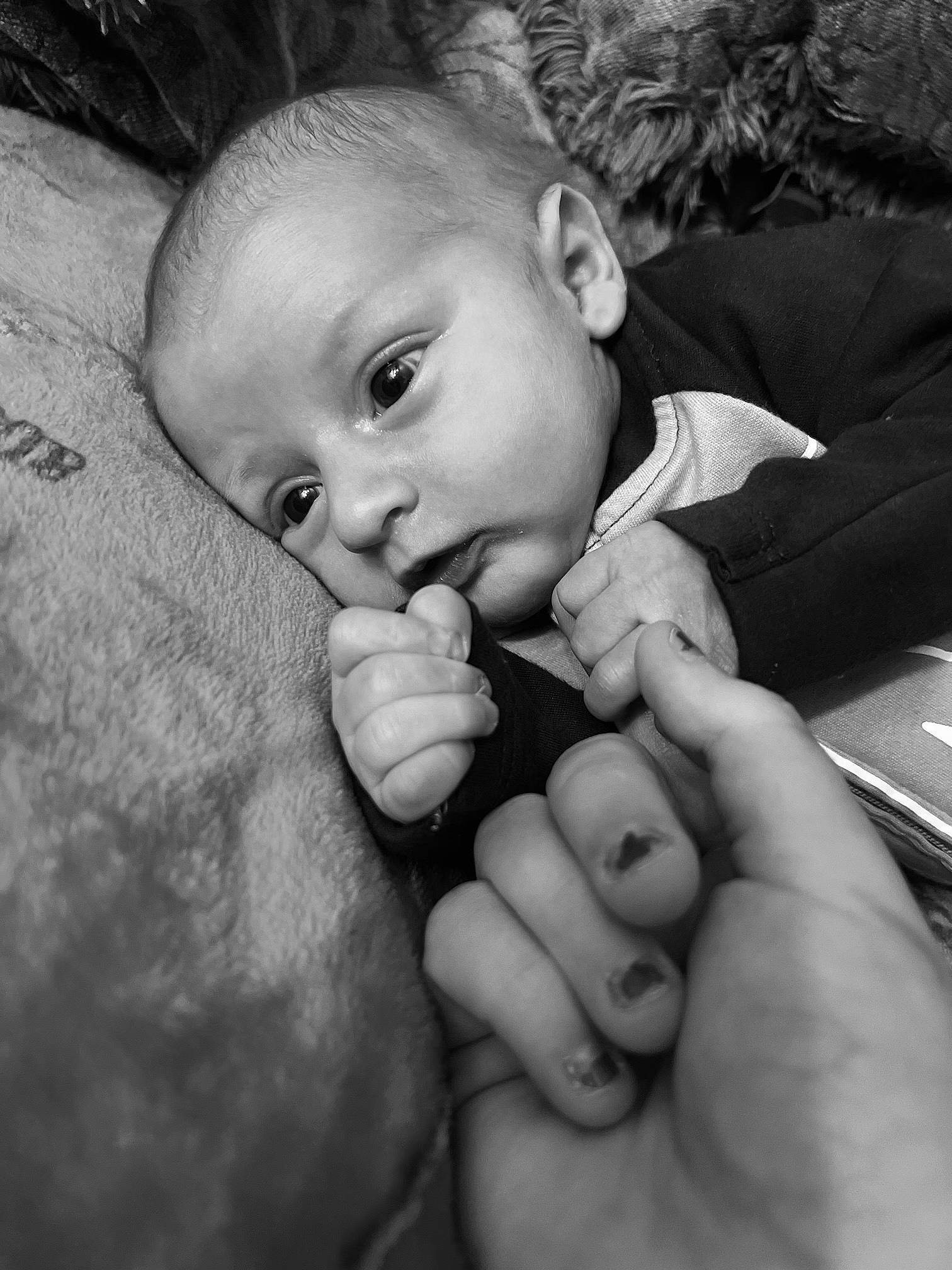 Kyson is registered to the contest to win money with this photo: baby, black_and_white, cheek, child, finger, flash_photography, gesture, hand, happy, head, lip, monochrome, monochrome_photography, mouth, nail, nose, person, skin, style, thumb