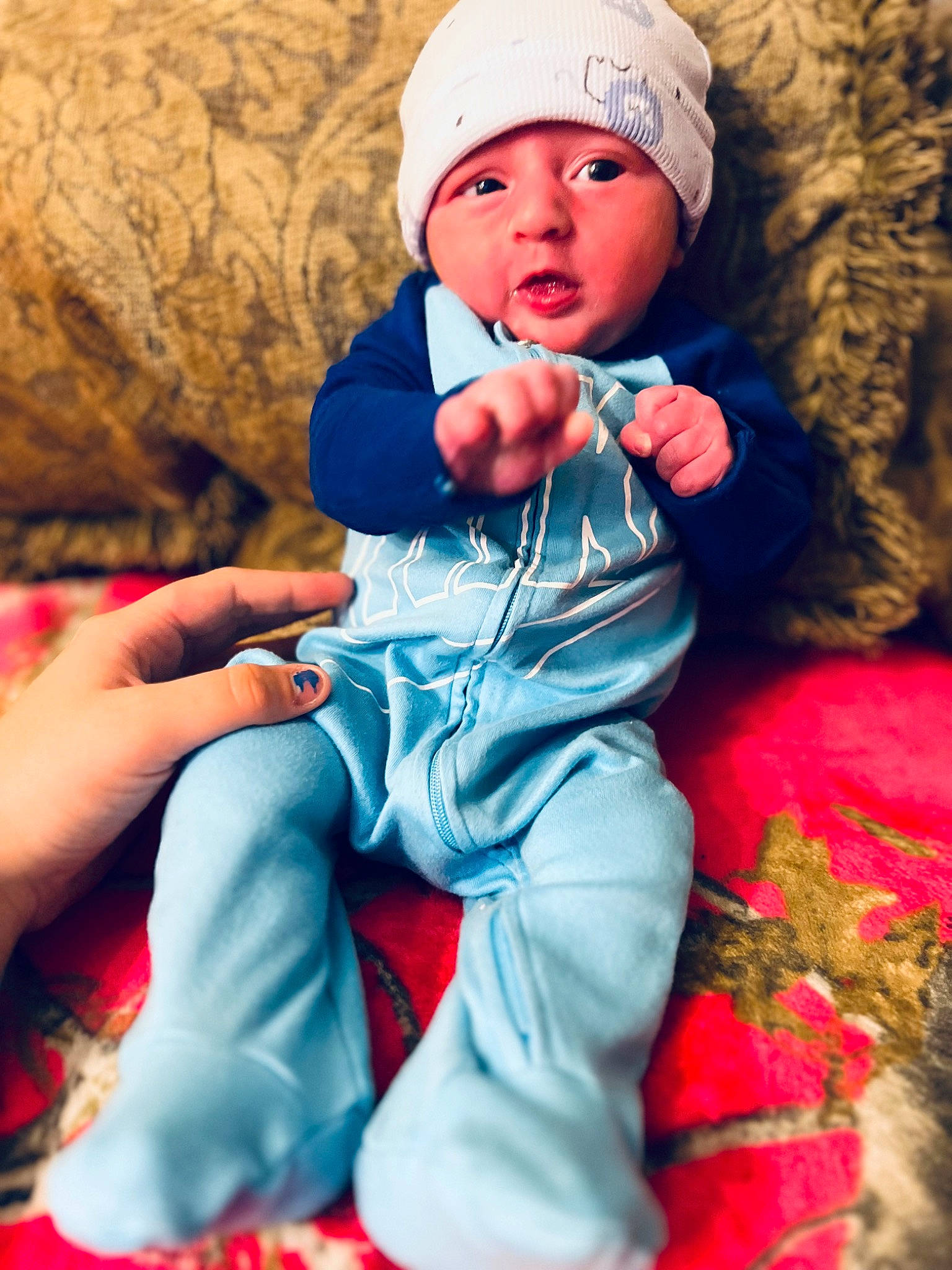 Kyson joined the competition — help win amazing prizes! baby, baby_toddler_clothing, cap, carmine, child, comfort, electric_blue, event, eye, face, hand, happy, hat, headwear, linens, magenta, person, pink, red, sitting
