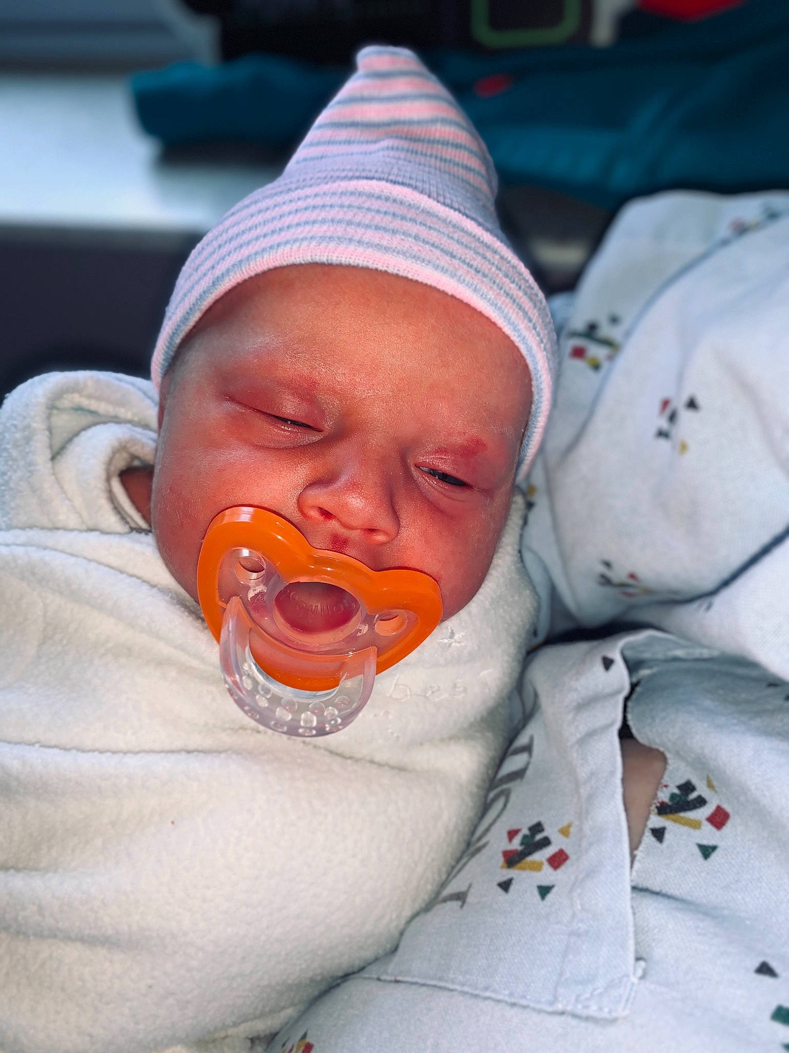 Evelynn is registered to the contest to win money with this photo: baby, child, facial_expression, food, headwear, mouth, nose, person, smile